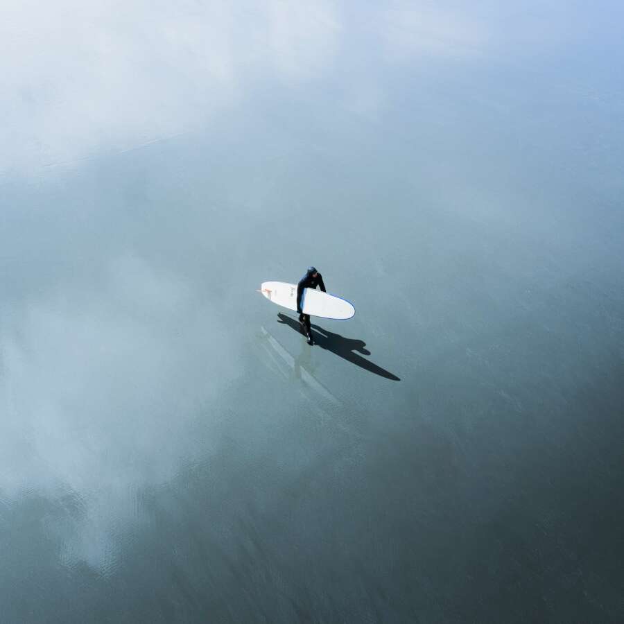 Surfer Beach Reflection